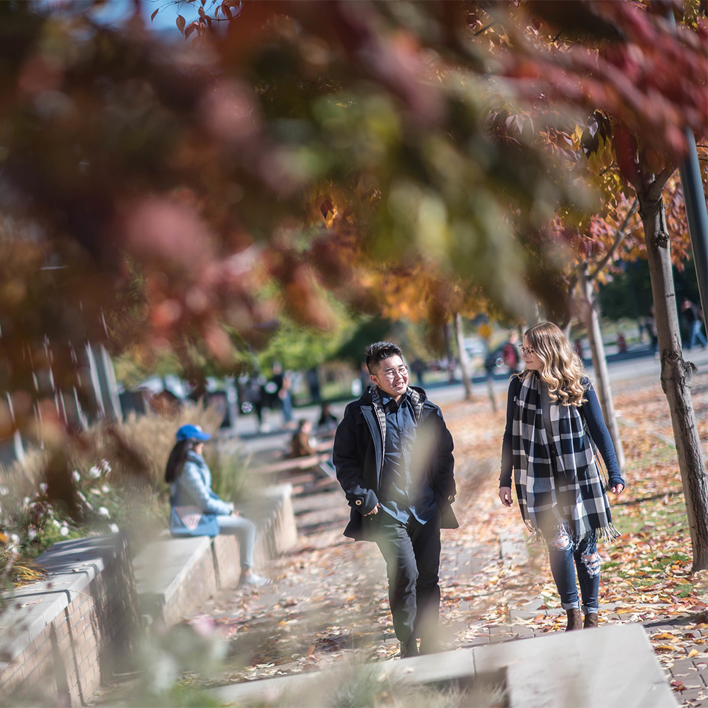 Student walking outdoors on the UBC Okanagan Campus